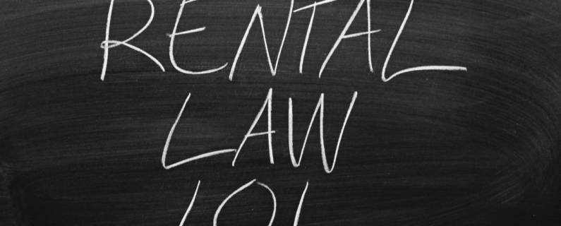 Property Management 'Rental Law 101' written in chalk on a blackboard, representing basic legal knowledge important for rental assistance programs